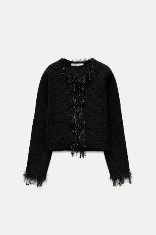 CHAQUETA PUNTO ACABADOS DESFLECADOS ABALORIOS