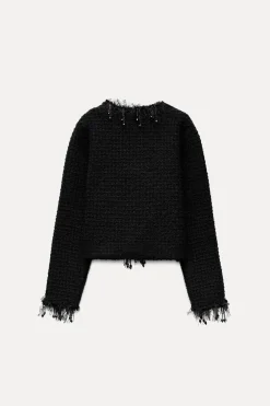 CHAQUETA PUNTO ACABADOS DESFLECADOS ABALORIOS