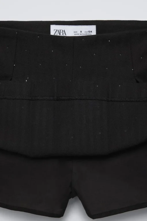 FALDA BERMUDA BRILLOS