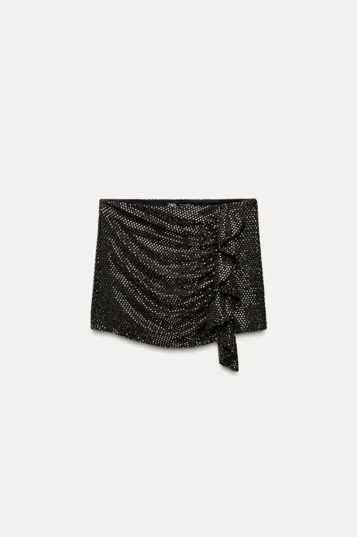 FALDA PANTALÓN VOLANTE BRILLOS