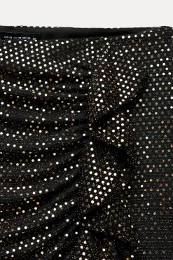 FALDA PANTALÓN VOLANTE BRILLOS