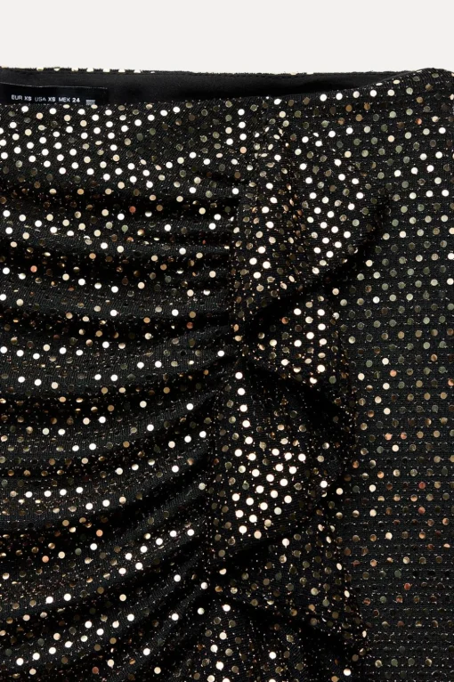 FALDA PANTALÓN VOLANTE BRILLOS