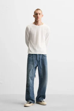 JEANS BAGGY FIT ESTAMPADOS X ALL CAPS STUDIO