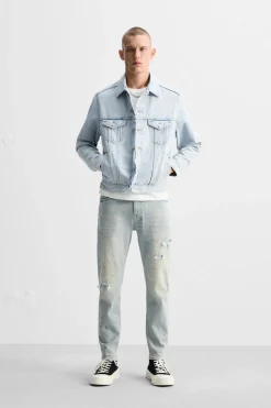 JEANS SKINNY PARCHES