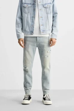 JEANS SKINNY PARCHES