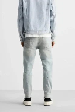 JEANS SKINNY PARCHES