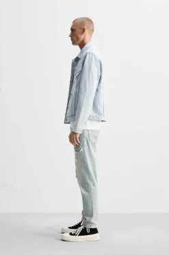 JEANS SKINNY PARCHES