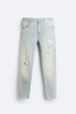 JEANS SKINNY PARCHES