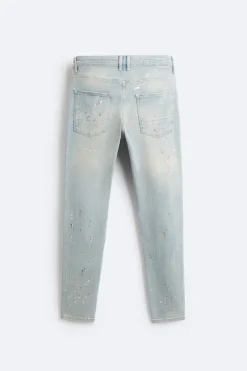 JEANS SKINNY PARCHES