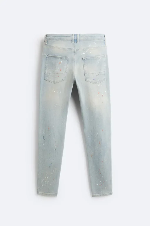 JEANS SKINNY PARCHES