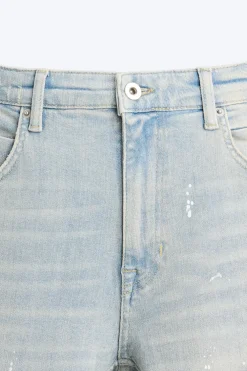 JEANS SKINNY PARCHES