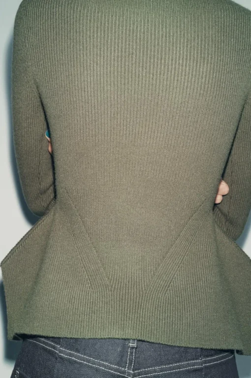 JERSEY PUNTO PEPLUM