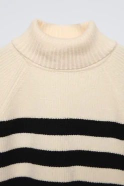 JERSEY PUNTO RAYAS CUELLO VUELTO