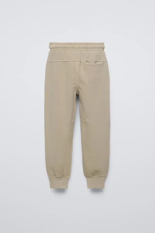 JOGGER FELPA CREMALLERAS