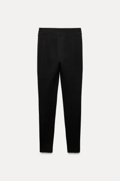 LEGGINGS BOTONES DORADOS