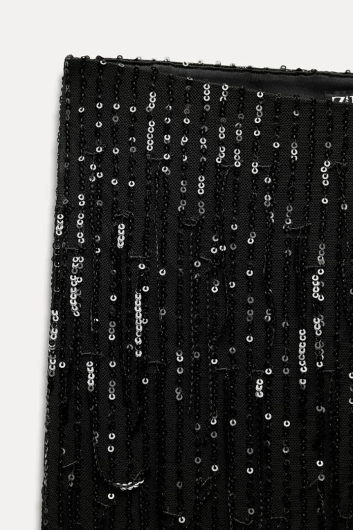 LEGGINGS FLECOS LENTEJUELAS