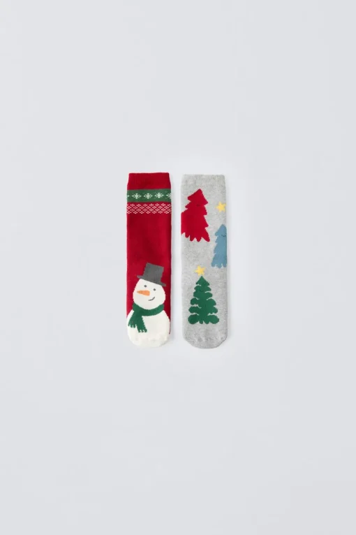 PACK DOS CALCETINES ANTIDESLIZANTES ÁRBOLES Y MUÑECO DE NIEVE