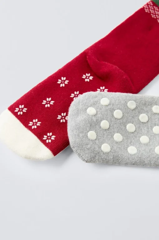 PACK DOS CALCETINES ANTIDESLIZANTES ÁRBOLES Y MUÑECO DE NIEVE