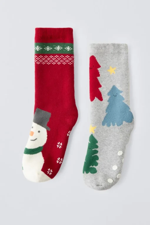 PACK DOS CALCETINES ANTIDESLIZANTES ÁRBOLES Y MUÑECO DE NIEVE