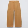 PANTALÓN ANCHO CORTES