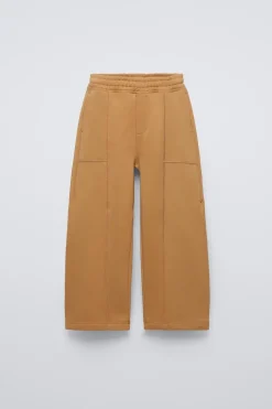 PANTALÓN ANCHO CORTES