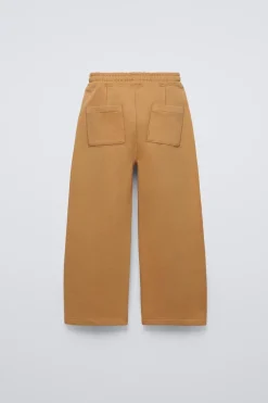 PANTALÓN ANCHO CORTES