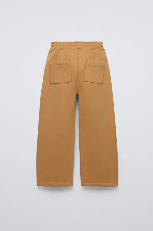PANTALÓN ANCHO CORTES