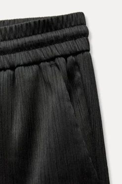 PANTALÓN ANCHO EFECTO ARRUGADO