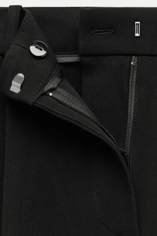 PANTALÓN ANCHO PINZAS CINTURÓN