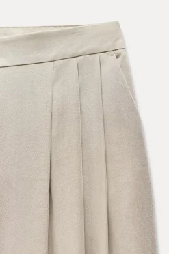 PANTALÓN ANCHO PLIEGUES