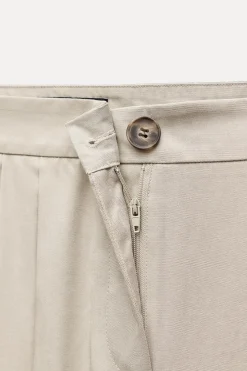 PANTALÓN ANCHO PLIEGUES