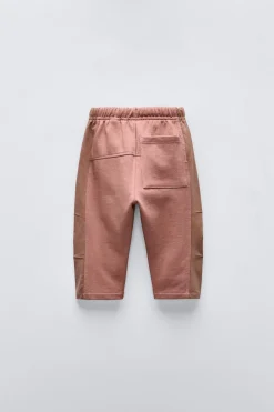 PANTALÓN COMBINADO