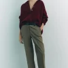 PANTALÓN COMBINADO CINTURA EFECTO PIEL