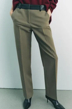 PANTALÓN COMBINADO CINTURA EFECTO PIEL