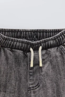 PANTALÓN DENIM CARGO