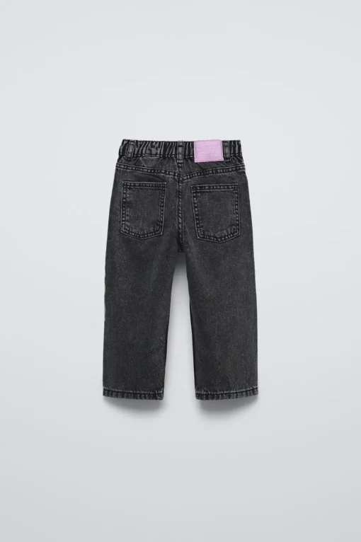 PANTALÓN DENIM TEXTO