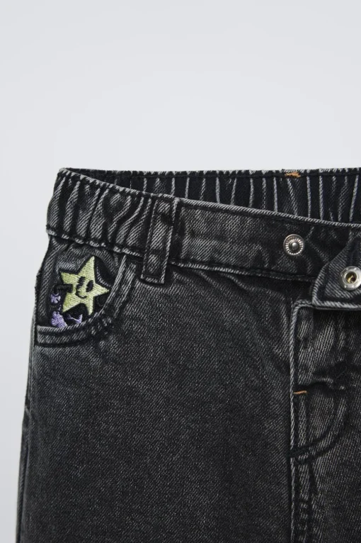 PANTALÓN DENIM TEXTO