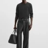 PANTALÓN EFECTO PIEL PLIEGUES