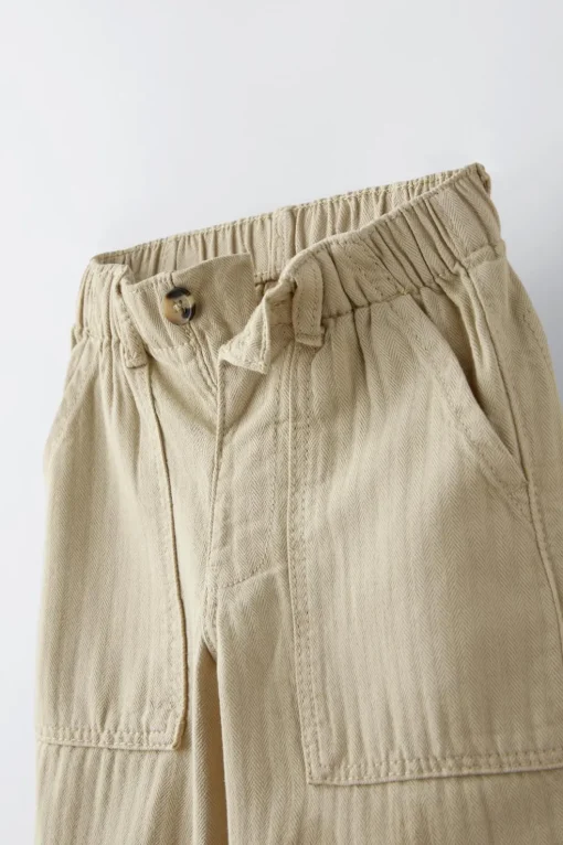 PANTALÓN ESPIGA BOLSILLOS