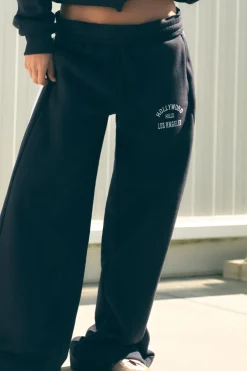 PANTALÓN FELPA TEXTO BANDA LATERAL