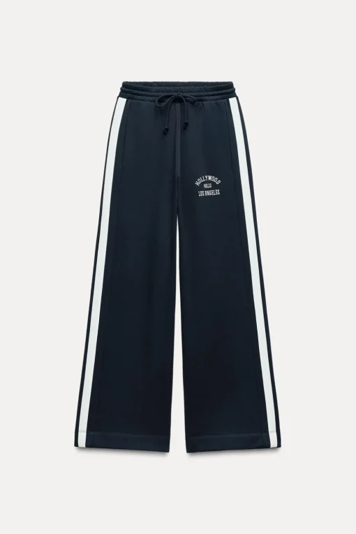 PANTALÓN FELPA TEXTO BANDA LATERAL