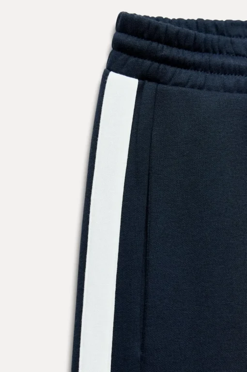 PANTALÓN FELPA TEXTO BANDA LATERAL
