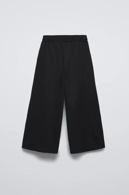 PANTALÓN INTERLOCK BOTONES