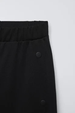 PANTALÓN INTERLOCK BOTONES