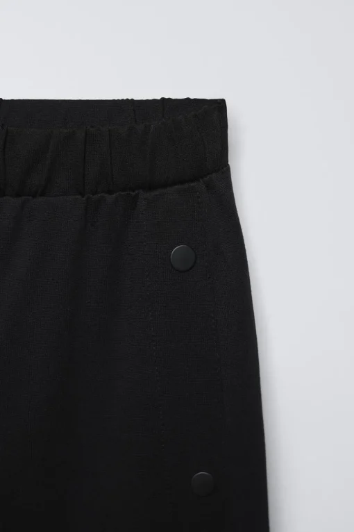 PANTALÓN INTERLOCK BOTONES