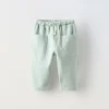 PANTALÓN LISO BOLSILLOS