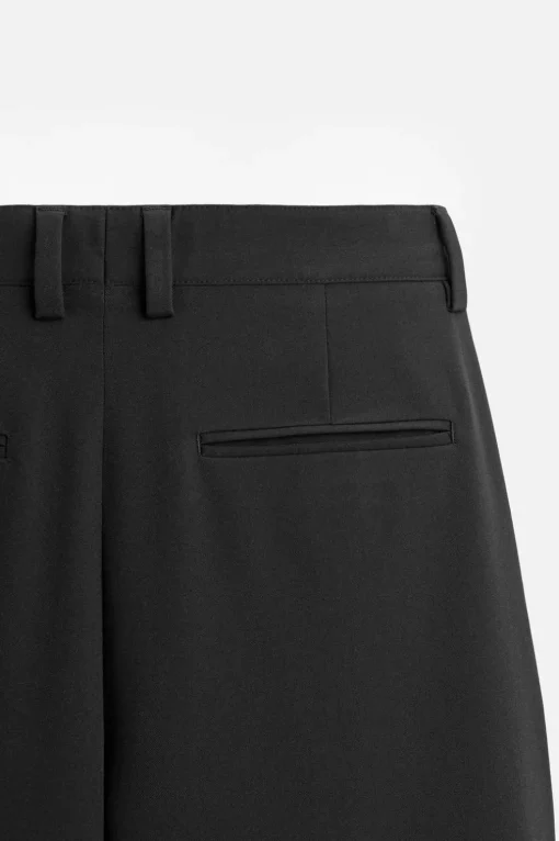 PANTALÓN OVERSIZE FIT PLIEGUES
