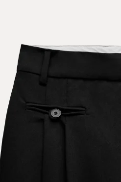 PANTALÓN PINZAS BOLSILLOS