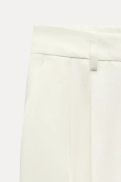 PANTALÓN RECTO VUELTA BAJO
