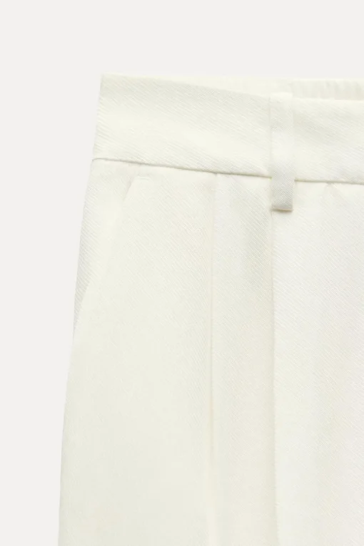 PANTALÓN RECTO VUELTA BAJO